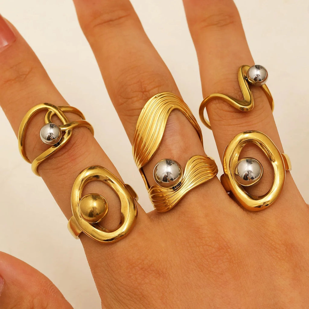 Stainless steel geometric open ring with 18K real gold finish and hollow line detail