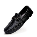 Men's black leather peas shoes with a silver belt buckle and flat rubber sole.