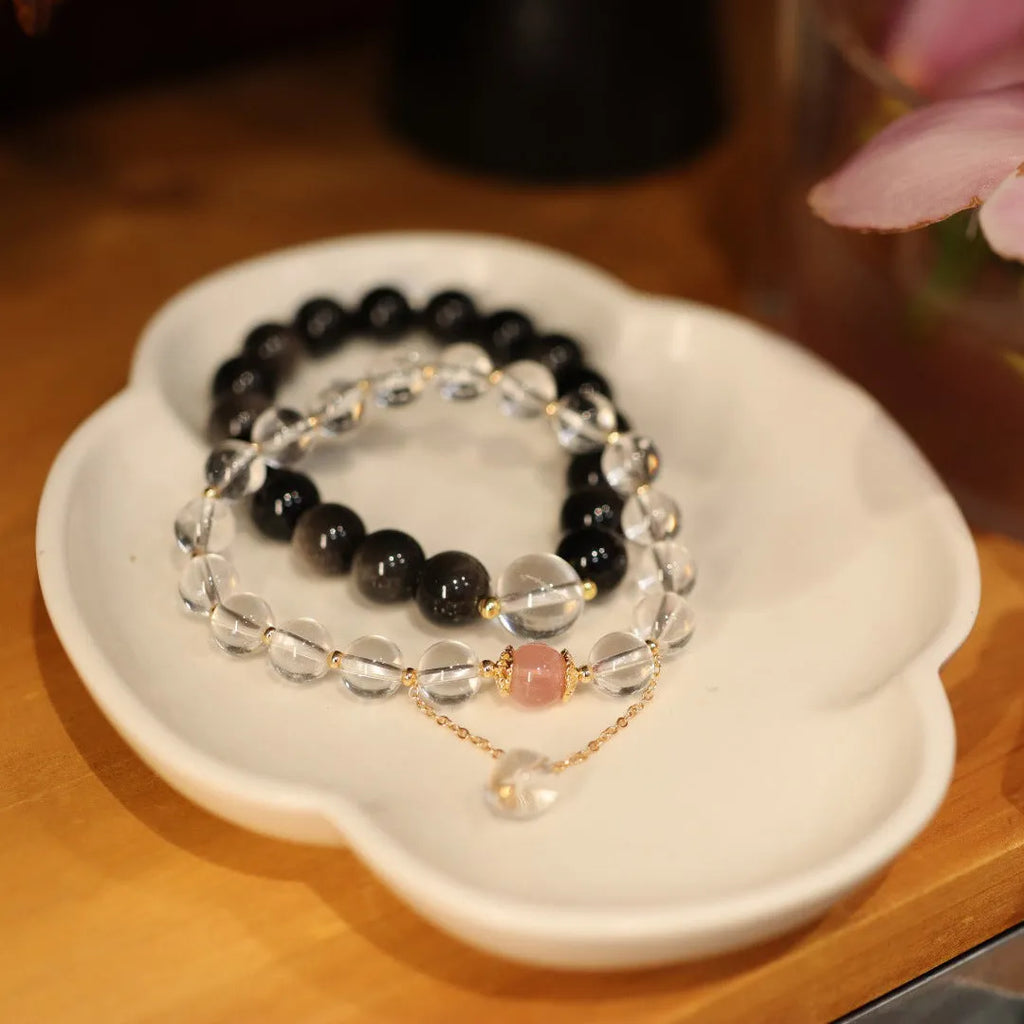 Geometric crystal bracelet with Chinese auspicious patterns in white and pink crystal beads