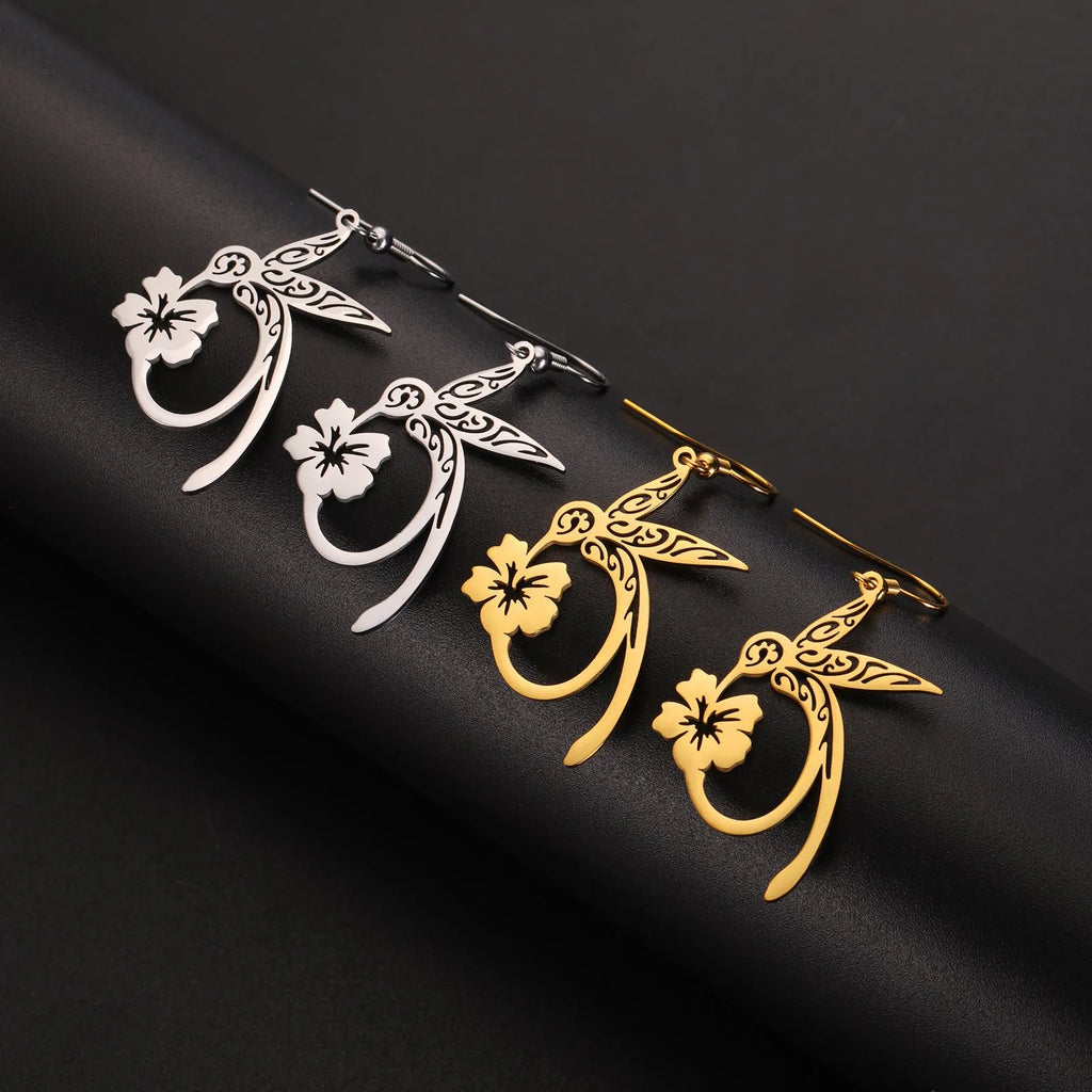 Pair of stainless steel hummingbird earrings with hollow openwork design, available in gold or steel colour