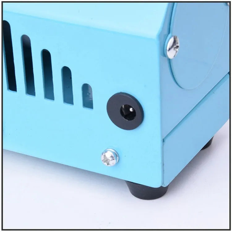Blue mini DIY woodworking lathe with protective cover on desktop, 150W motor, steel chuck, and accessories