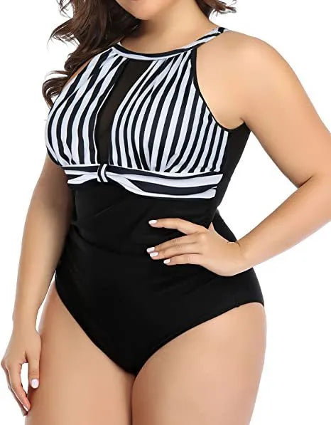 Women's black lace one-piece swimsuit on a hanger showing front design