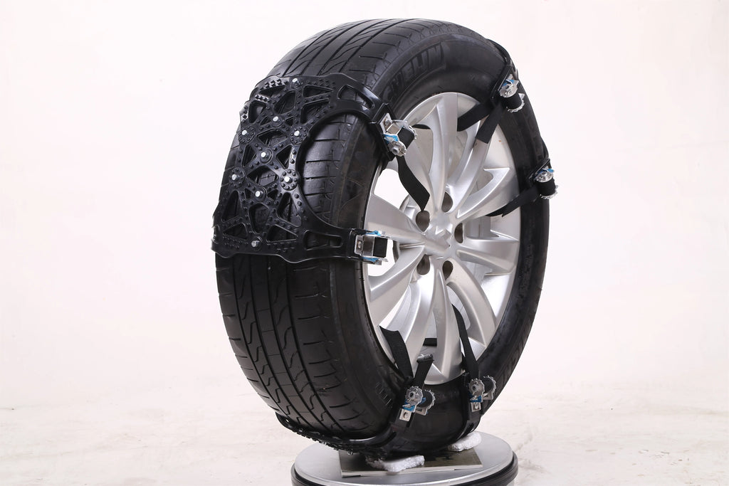 Yellow universal snow chain made from widened thickened TPU with steel nails for non-slip winter traction