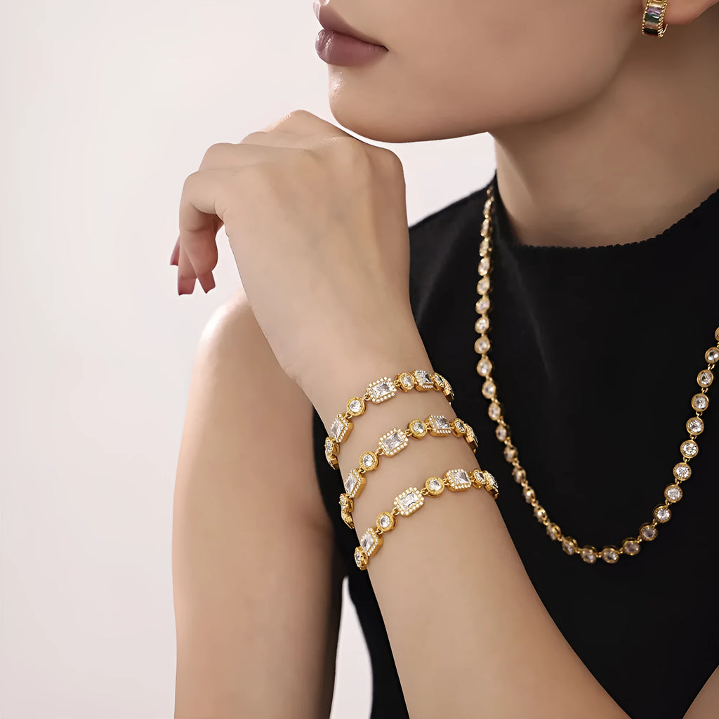 Titanium steel unisex bracelet with square zircon rhinestone inlay, geometric design, gold or steel colour.