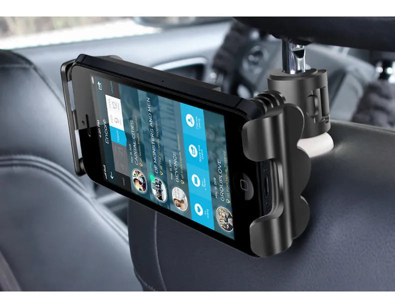 Car headrest tablet holder with extendable arm mounted on vehicle seat