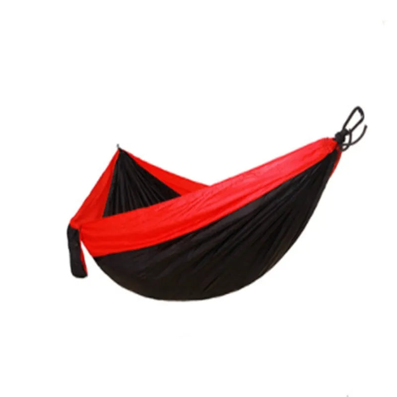 Double widened camping hammock 275x140cm in 210T nylon parachute fabric with steel buckles and ropes, shown outdoors in a garden setting