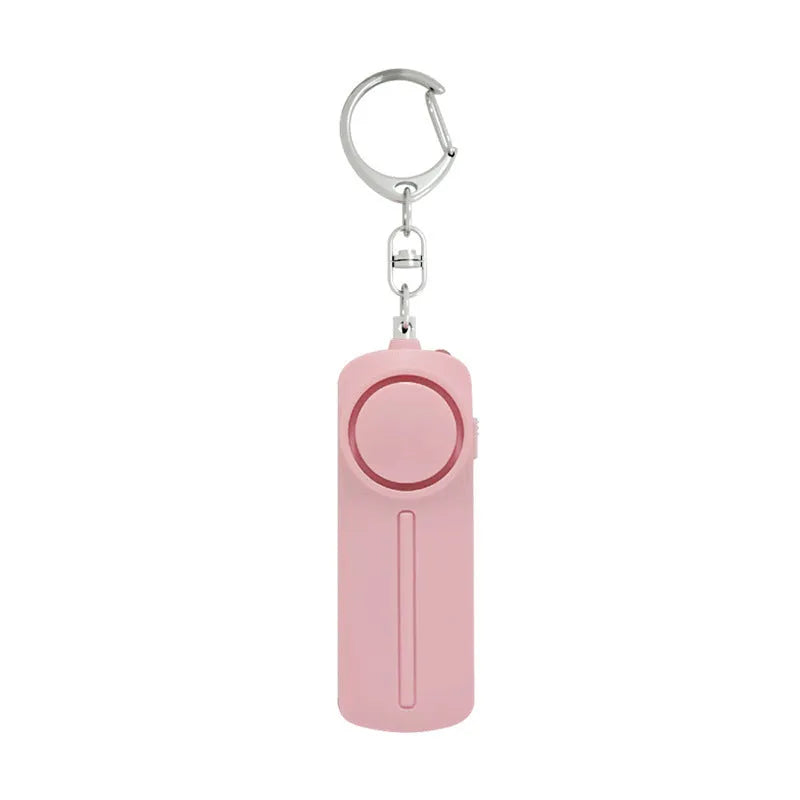 Compact pink personal safety alarm showing 86mm length on a keyring.