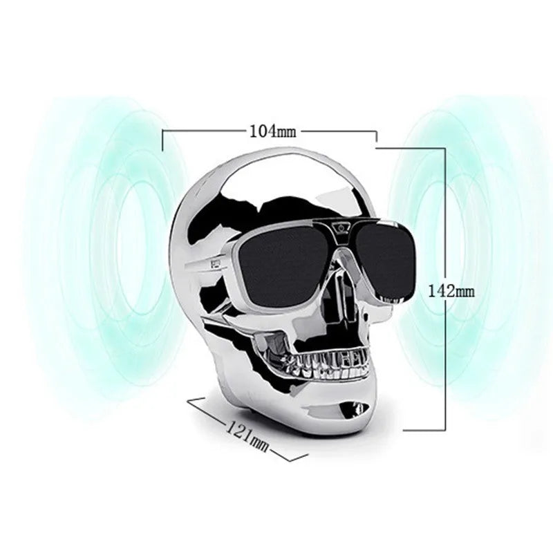 Skull-shaped wireless Bluetooth speaker with rechargeable battery showing front detail and colour options