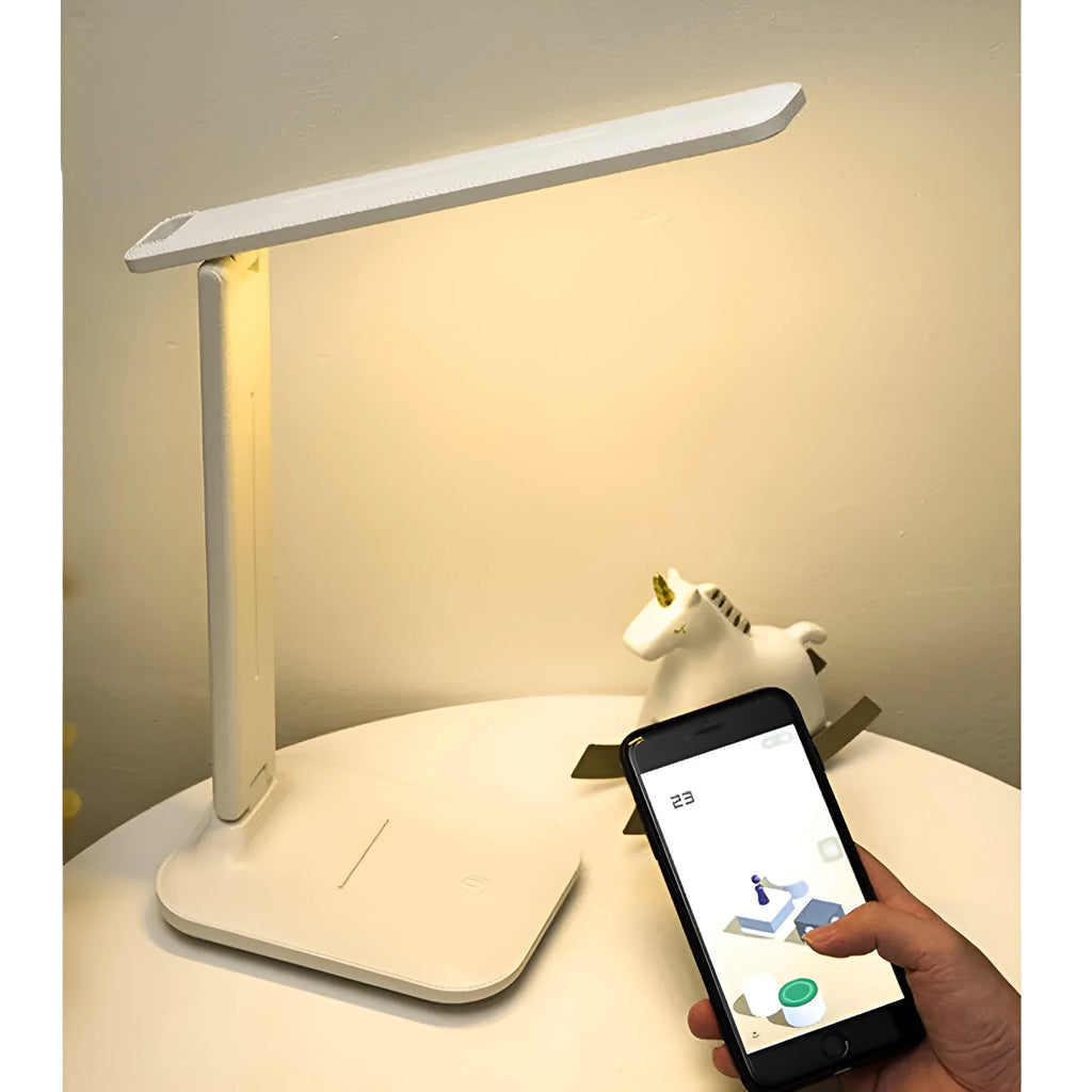 White touch dimming colour-changing bedside lamp with USB charging cable.
