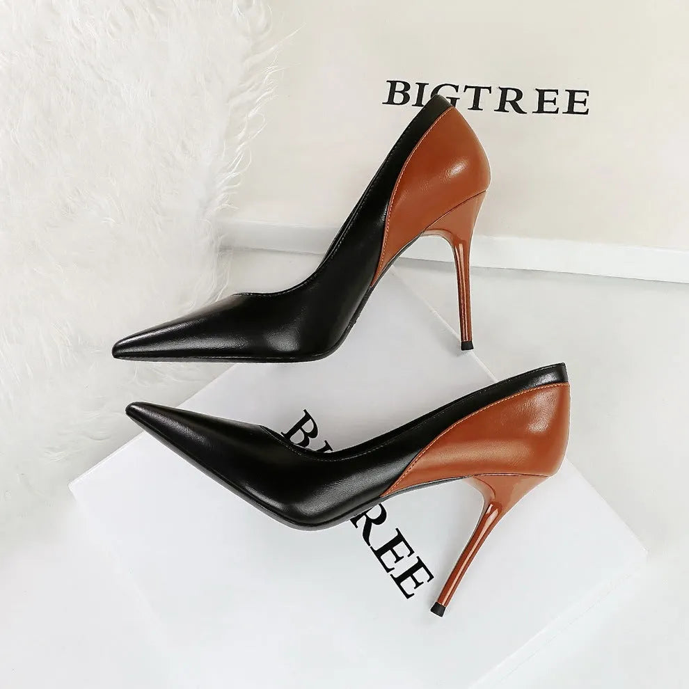 Retro black and creamy-white women's stiletto pumps with pointed toe for banquets