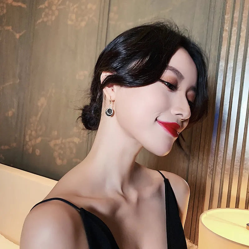 Black geometric alloy earrings with 3.6cm drop length and retro Hong Kong style design