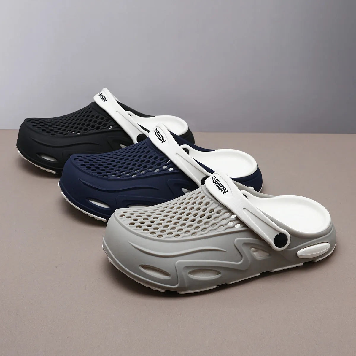 Men's grey closed toe beach slippers with EVA sole and round toe holder design