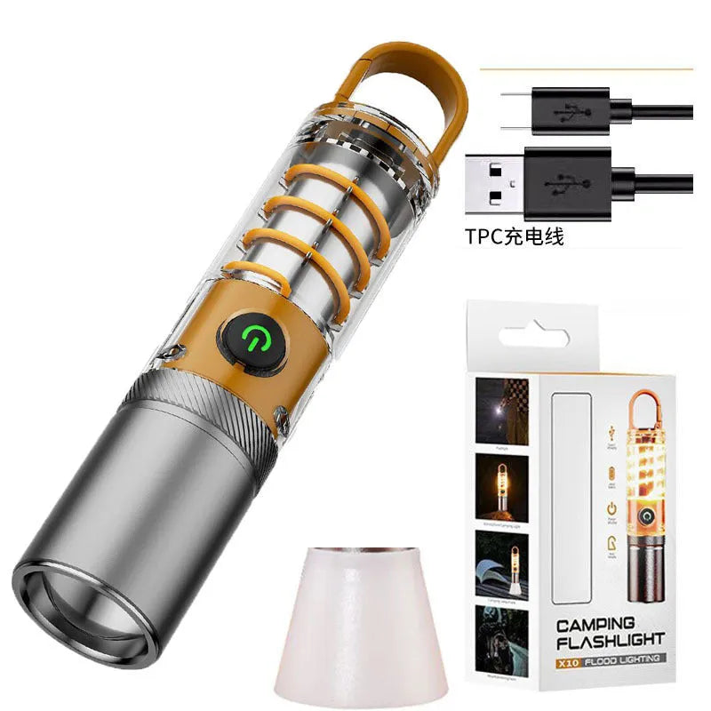 Orange 10W LED flashlight with dual light source, optical zoom, and USB charging cable