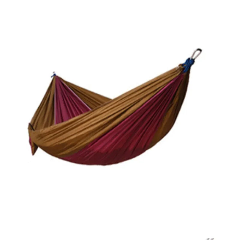 Double widened camping hammock 275x140cm in 210T nylon parachute fabric with steel buckles and ropes, shown outdoors in a garden setting