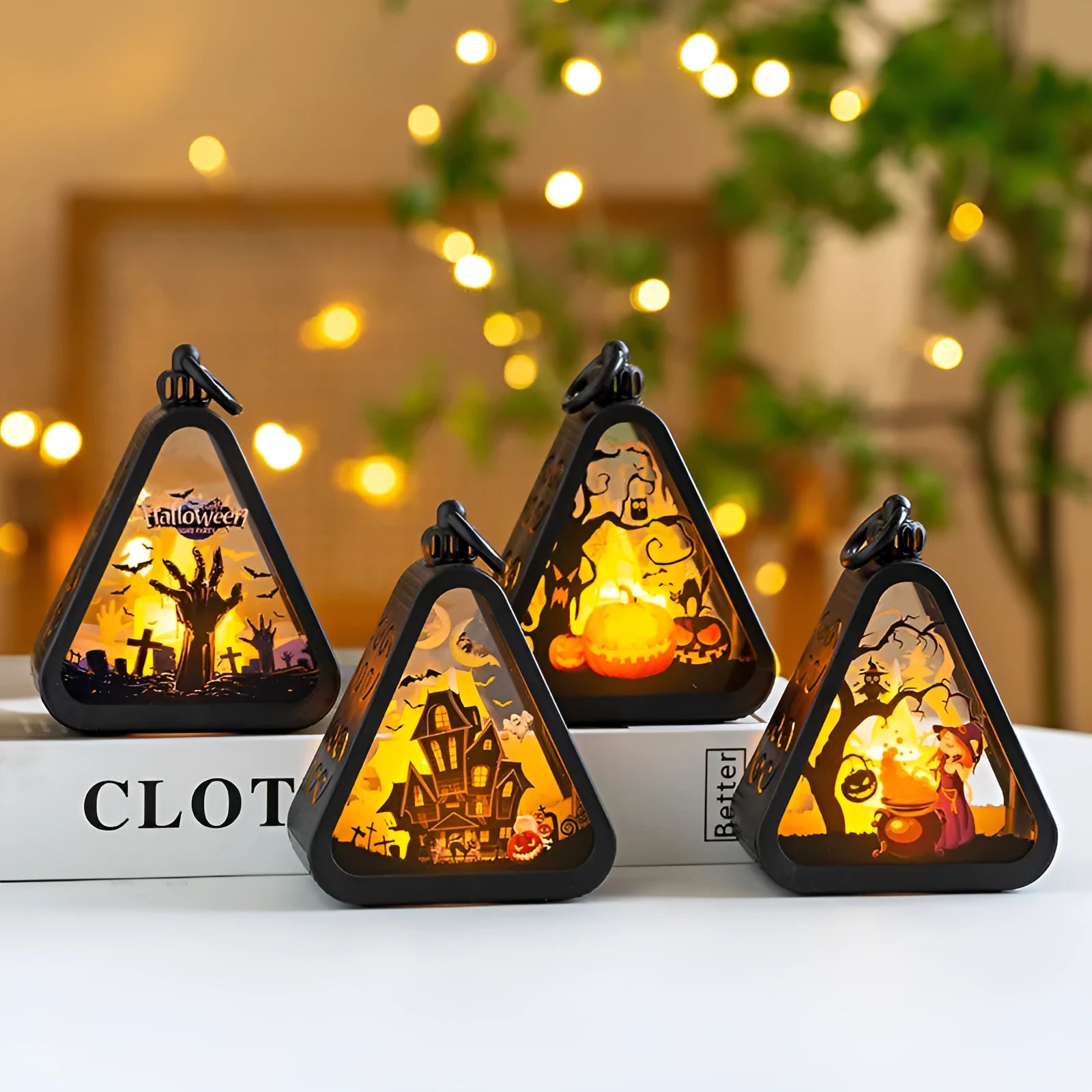 Portable Halloween lamp decoration in pumpkin design with plastic and glass construction.