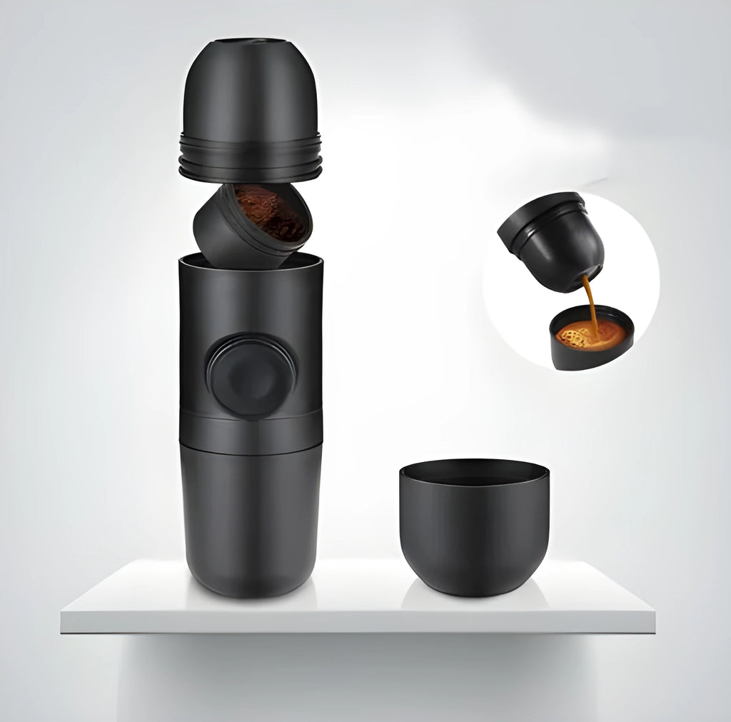Black portable manual coffee machine showing compact size and manual operation components.