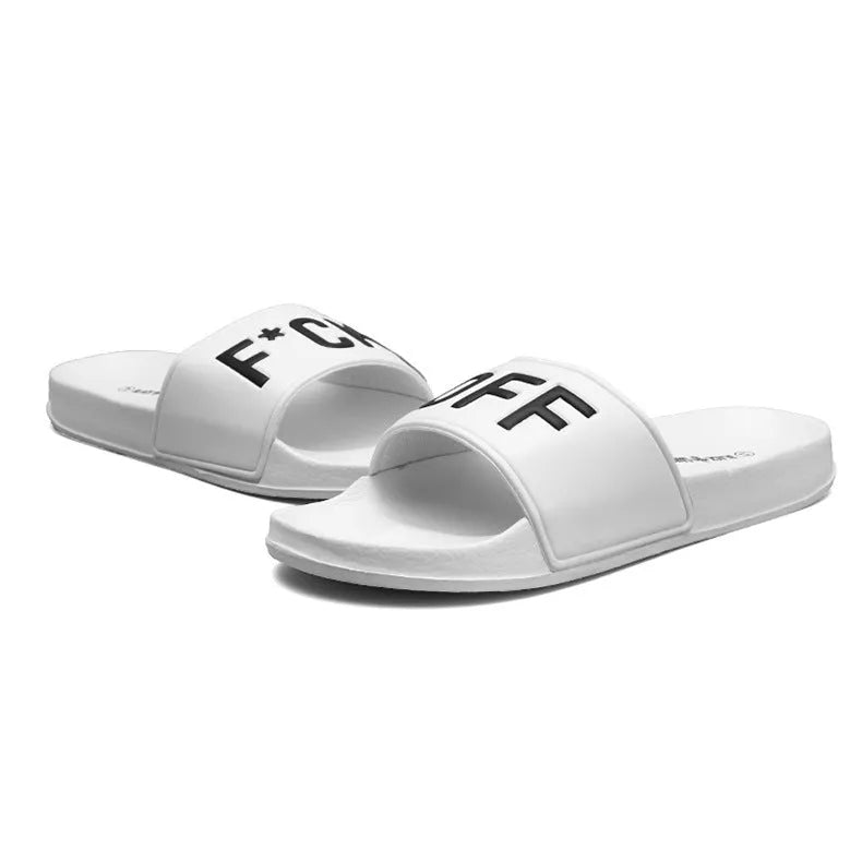 Men's black open-toe slippers with a soft viscose upper and textured rubber sole.