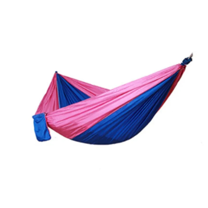 Double widened camping hammock 275x140cm in 210T nylon parachute fabric with steel buckles and ropes, shown outdoors in a garden setting