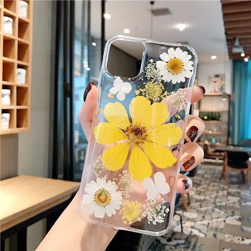 Floral TPU phone case with large pink and yellow flower designs for iPhone