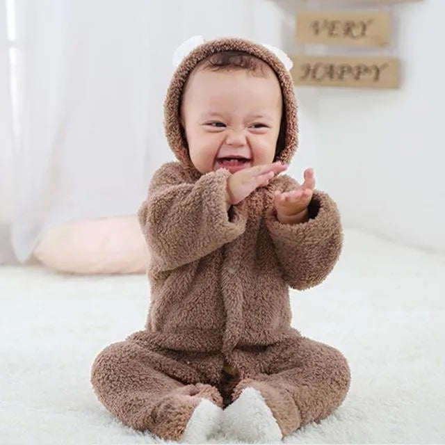 Unisex baby winter romper in cotton blend, O-neck pullover, available in eight colours and sizes 0 3M to 9 12M.