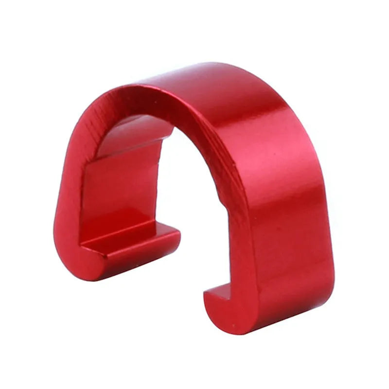 Set of ten small aluminium alloy C-shaped buckles in assorted colours on a white background.