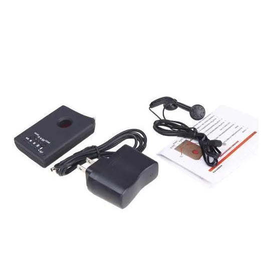 Black anti-spy hidden camera signal detector with antenna, 65x48x15mm, on grey background