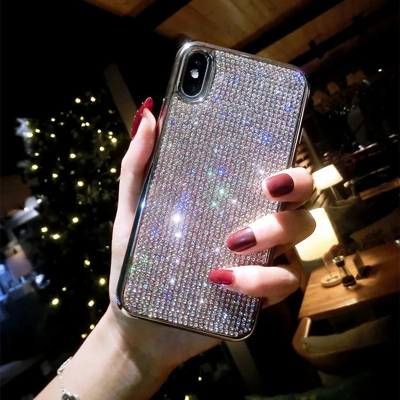 Silver silicone iPhone case with full diamond crystal decoration showing front and back views