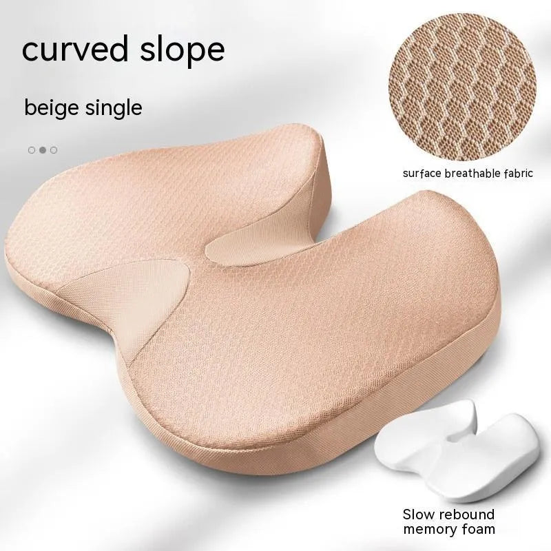 Curved bevel anal support seat cushion in solid colour on a car seat.