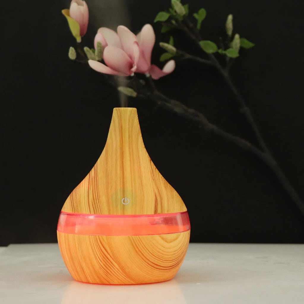 USB mini desktop air purifier and humidifier in wood grain finish for small rooms.