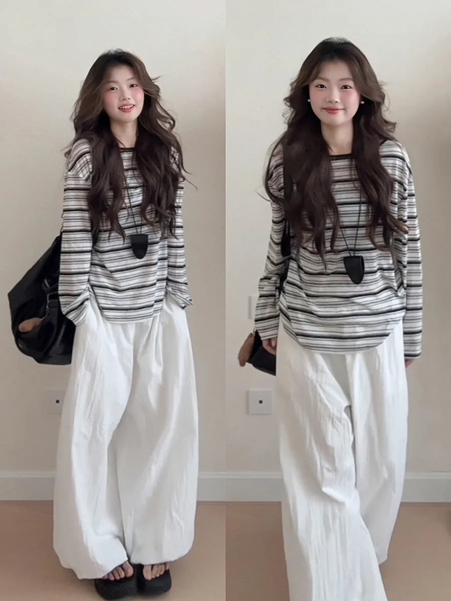 Black stripes long sleeve relaxed fit polyester T-shirt with sun protection, front view