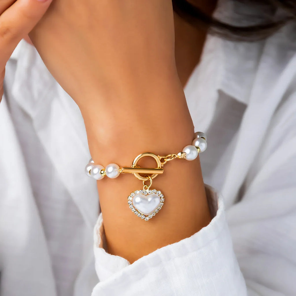 Gold alloy bracelet set with multi-portrait pearl and cartoon character design for women