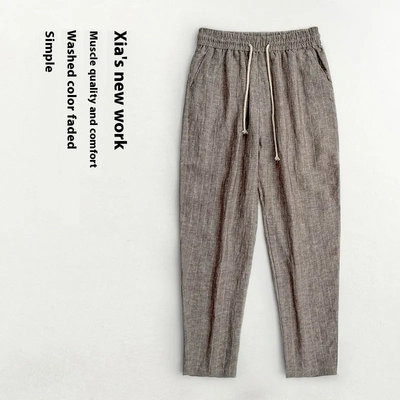 Men's lightweight cropped linen-cotton trousers in a striped pattern, shown in khaki colour.