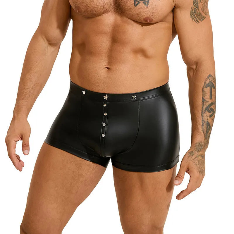 Black men's leather-look shorts with U-pouch front design on a model
