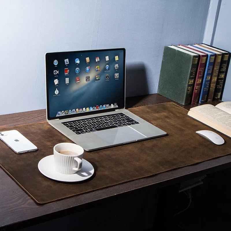 Extra large non-slip coffee mad horse skin leather desk pad, 90cm x 45cm, on a computer desk with keyboard and mouse.