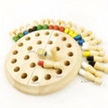 Montessori beech wood memory match stick chess game with green pieces on a wooden board.