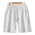 Men's straight-leg cotton summer shorts in light grey, shown on a hanger.