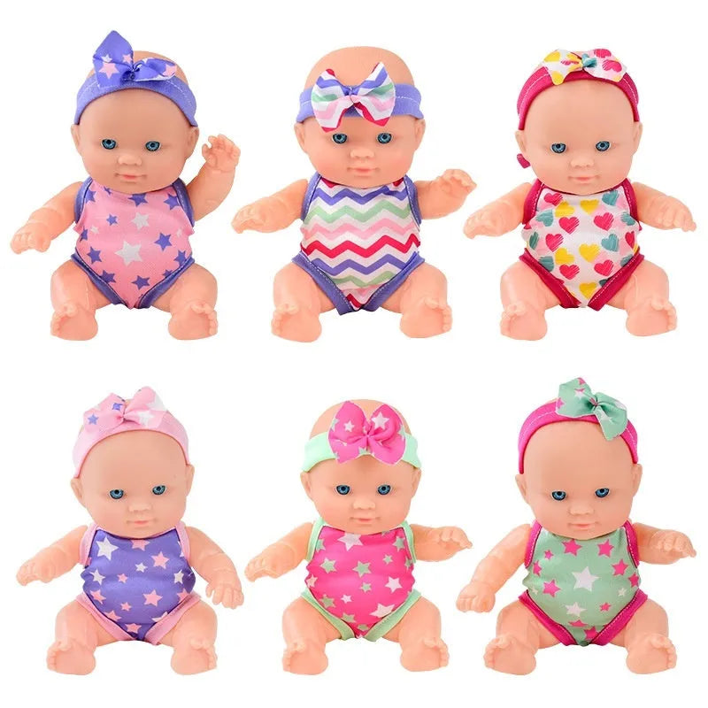 Vinyl baby figurine doll with movable limbs showing detailed facial features