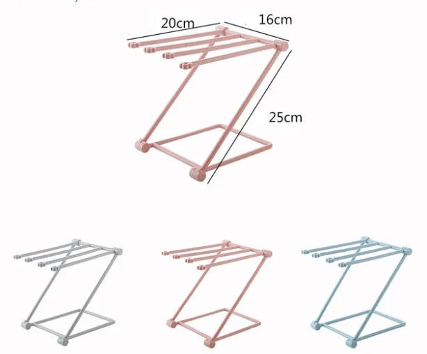 Foldable plastic dishcloth shelf organiser in light blue mounted on wall