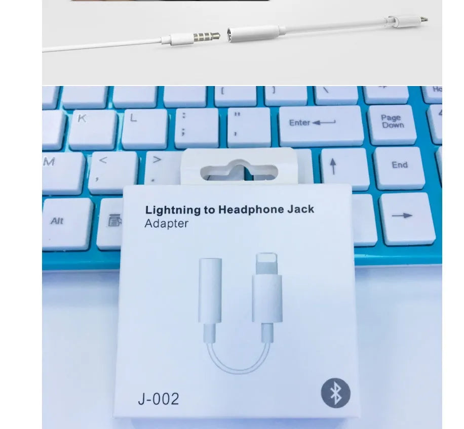 White Lightning to 3.5mm female headphone jack adapter for iPhone compatibility.