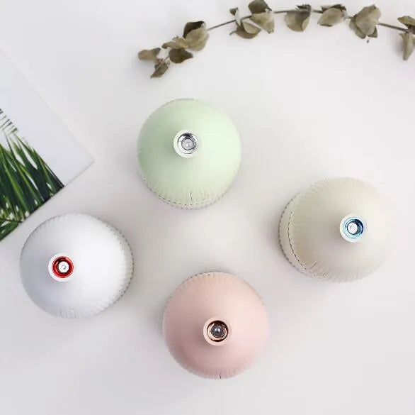 White USB-powered aromatherapy diffuser humidifier with coloured LED light and 300ml tank.