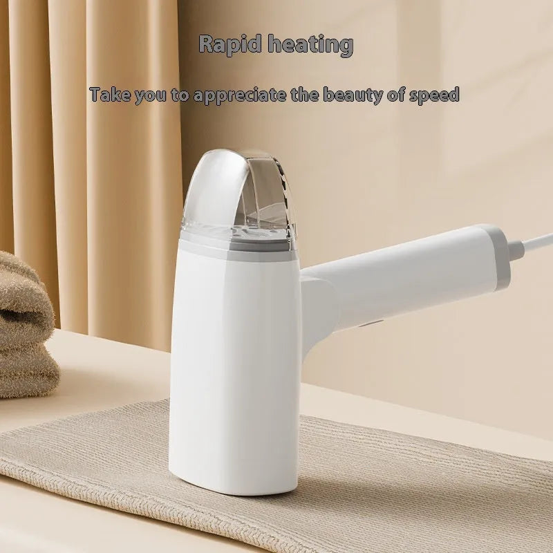 Blue and white handheld garment steamer with water tank and power cord.