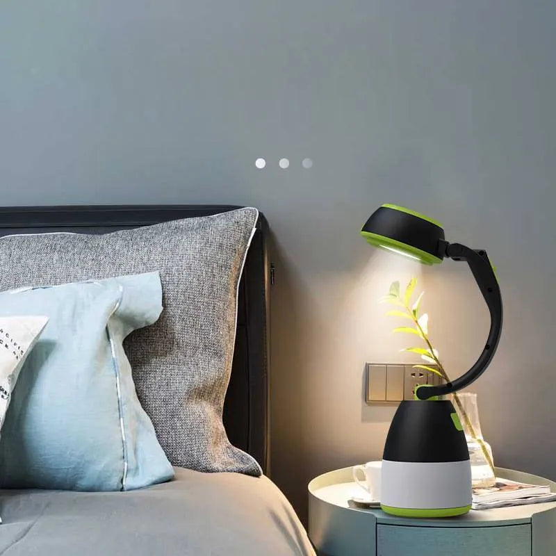 Black green 3-in-1 multifunctional LED table lamp and foldable camping flashlight.