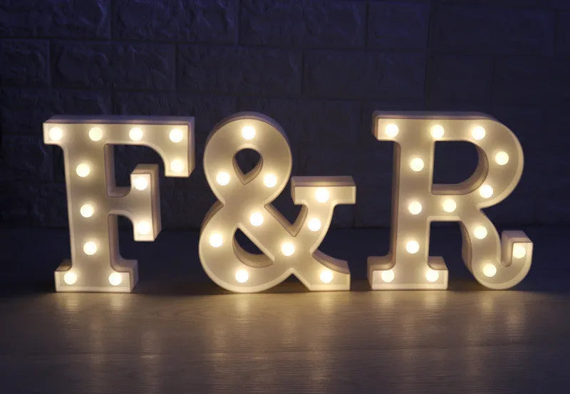 White plastic LED marquee sign letter lamp, 22 cm high, with warm white glow and battery compartment