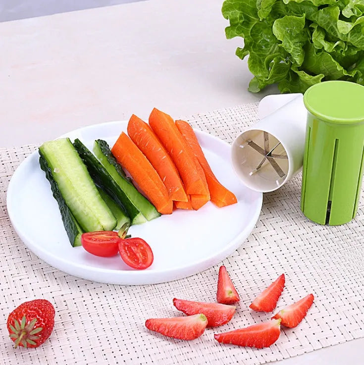 White ABS plastic vegetable slicer with stainless steel blades for cucumbers, carrots, and strawberries