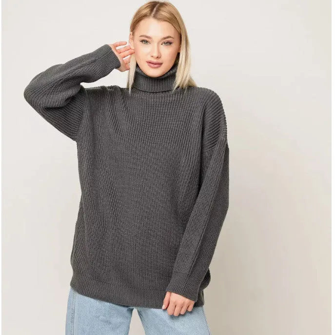 Women's loose-fit high neck pullover sweater in solid colour on hanger.