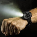 Rechargeable LED display wrist watch flashlight with CREE XPE bulb and nylon strap on outdoor background
