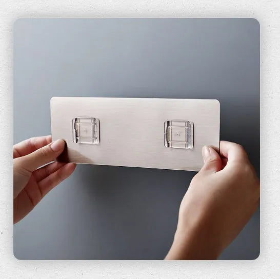 White plastic freestanding kitchen knife rack on a countertop.