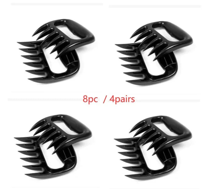 Black barbecue meat claw fork set with decorative patterns for meat shredding and food preparation