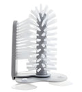 Grey double-head rotating cup brush with suction cups for wall mounting