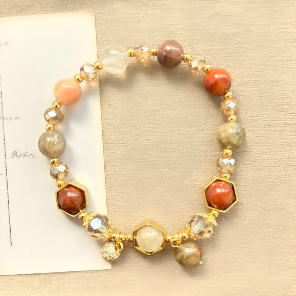 Gold colour citrine crystal bracelet with 8mm beads featuring Chinese auspicious symbols including Ruyi and Fu character